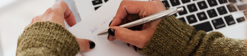 Home buyer reviewing financial documents before applying for a home loan pre-qualification.